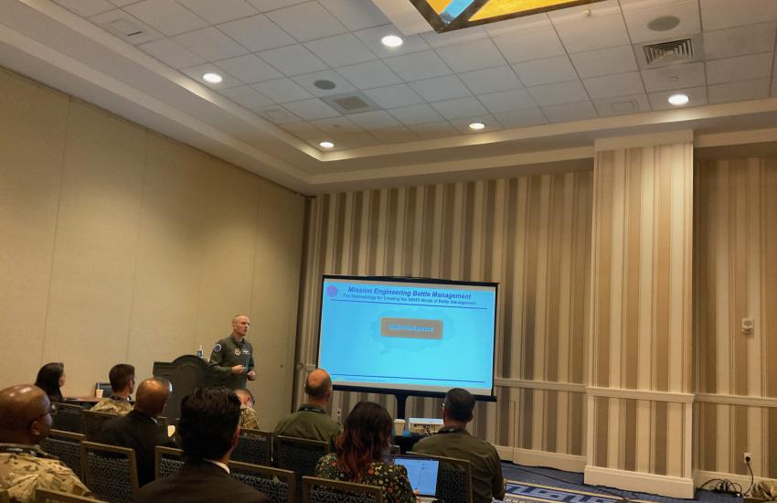 Col. Jonathan "Beep" Zall, USAF, presents the new ABMS model.