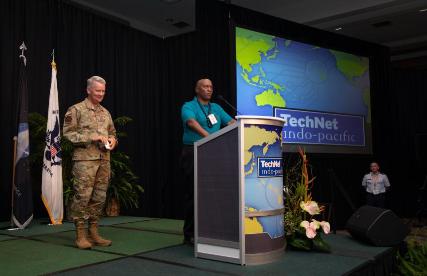 Retired Air Force Col. Mike Black, vice president, Defense, AFCEA International, thanks Lt. Gen. James Jacobson for speaking at TechNet Indo-Pacific. The general encouraged industry to show their capabilities to PACAF.