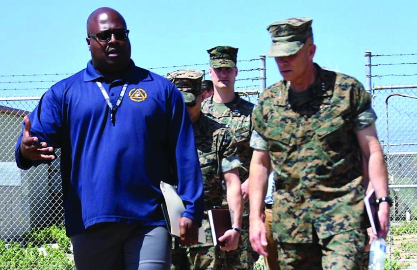 Martin Moore (l), a Ground Radio and Terrestrial High-Capacity Communications officer, walks with Lt. Gen. Matthew Glavy, USMC, during a visit to the Marine Corps Tactical Systems Support Activity at Camp Pendleton, California, in June 2022. Credit: USMC Photo by Amy Forsythe, Public Affairs Officer, MCTSSA
