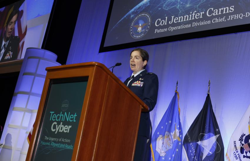 Col. Jennifer Carns, USAF, Future Operations division chief, JFHQ-DODIN, discusses the Set the Globe initiative during TechNet Cyber 2023. Credit: Michael Carpenter