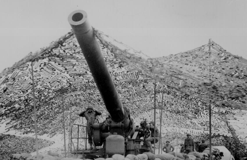 The need for an industrial complex was proven necessary following World War II. Pictured are Army soldiers of Battery B, 687th Field Artillery Battalion, preparing to fire a 240 mm Howitzer into German-held territory near Mignano, Italy, January 1944. Photo by Katie Lange, National Archives