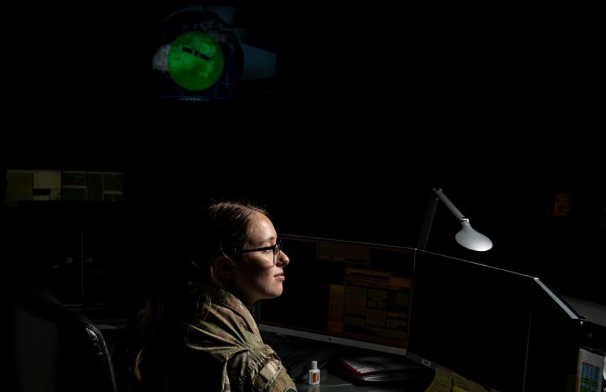 U.S. Space Force 2nd Lt. Rebecca Hetrick a satellite vehicle operator assigned to the 2nd Space Operations Squadron, monitors the health of a GPS satellite at Schriever Space Force Base, Colorado, on January 25, 2022. In the Integrated Mission Delta concept, operators are combined with sustainers and acquisition personnel, making decision-making more effective, leaders say. Credit: U.S. Space Force Photo by Lekendrick Stallworth