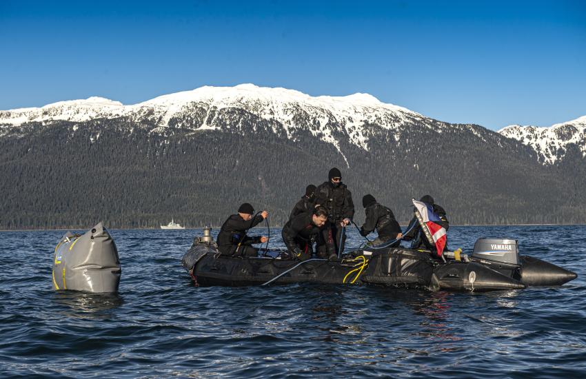 Clearance divers from from the Royal Canadian Navy recover a simulated underwater mine while conducting mine countermeasure missions near Juneau, Alaska. Credit: Master Sailor Dan Bard, Canadian Canadian Armed Forces.