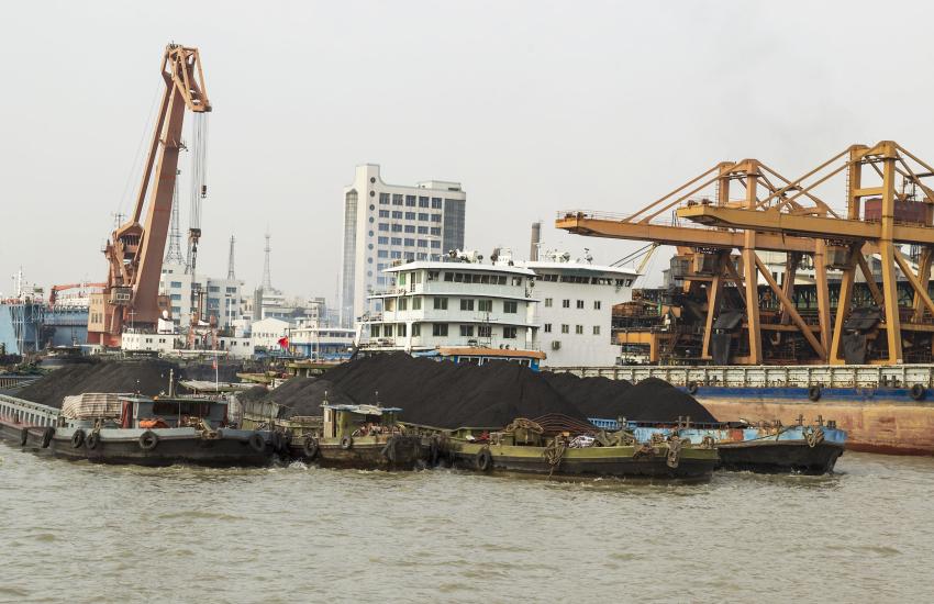 Cargo ships loaded with rare earth soil for export in China. Credit: tab62/Shutterstock