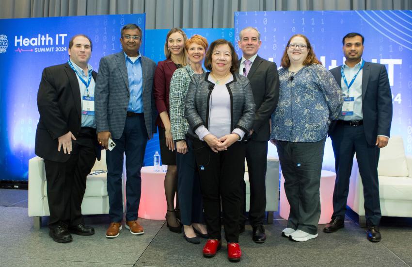 Belinda Seto poses for a picture with fellow health care experts at the annual Health IT event in Bethesda, Maryland. Credit: Flickr image from Bethesda AFCEA