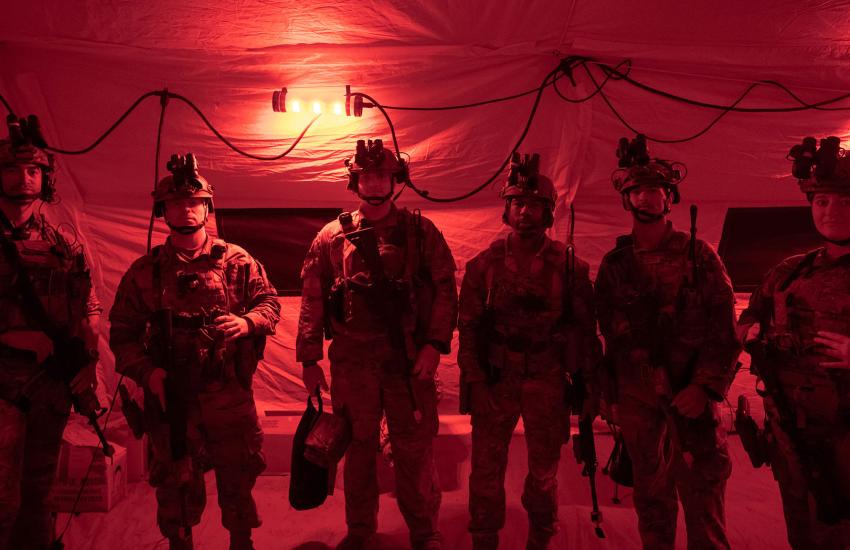 U.S. Air Force airmen from the 435th Security Forces Squadron gather in a tactical operations center before conducting night operations during the Thracian Summer 2021 exercise at Cheshnegirovo Air Base, Bulgaria,in August 2021. The complex mission environment in the NATO region calls for increased interoperability, joint readiness and deterrence efforts in an increasingly contested environment.