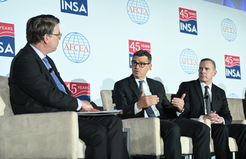 New York Times reporter Julian Barnes speaks with David S. Cohen, deputy director of the Central Intelligence Agency, and Paul Abbate, deputy director of the FBI. Photo: Herman Farrer