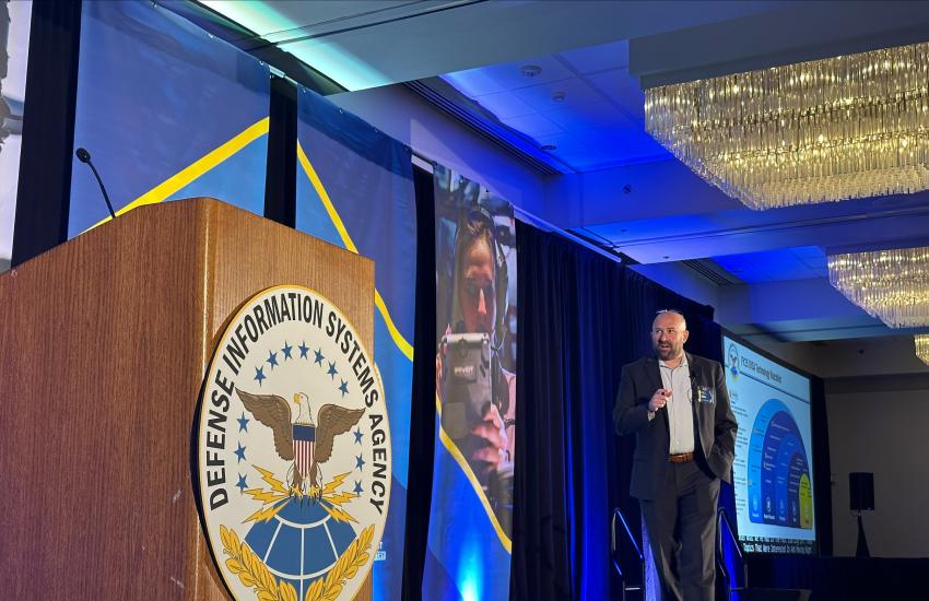 Steve Wallace presents the Defense Information Systems Agency's areas of focus in technology for Fiscal Year 2025 at DISA's annual Forecast to Industry event on October 28, 2024.