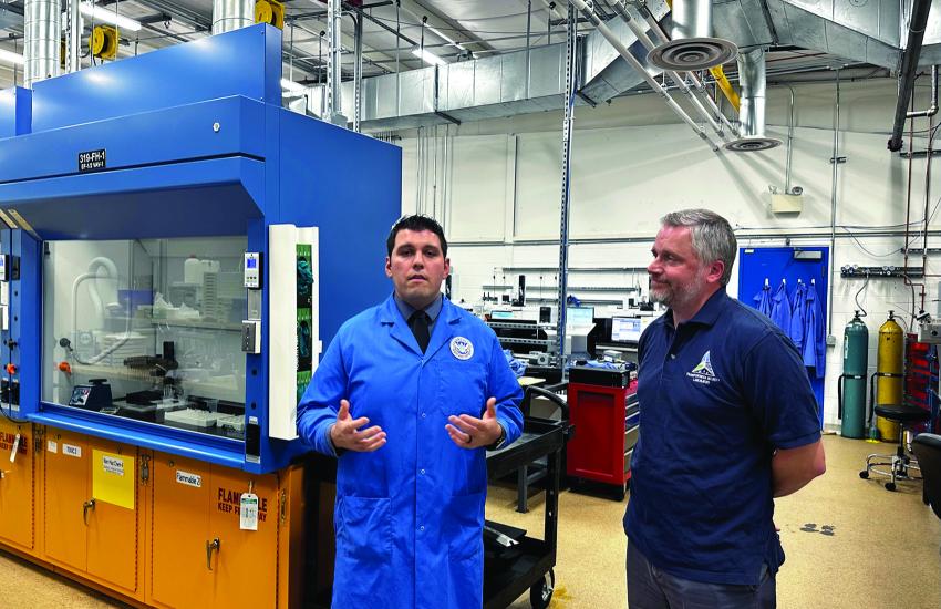 The lab is testing new instrumentation, called ion mobility spectrometry-mass (IMS-MS) spectrometry, which could be used to find emerging explosives-related threats, explained Johnny Perez (l), a chemist in the lab’s Applied Research division, standing with Jason Stairs, manager, Developmental Test and Evaluation Chemistry Branch.