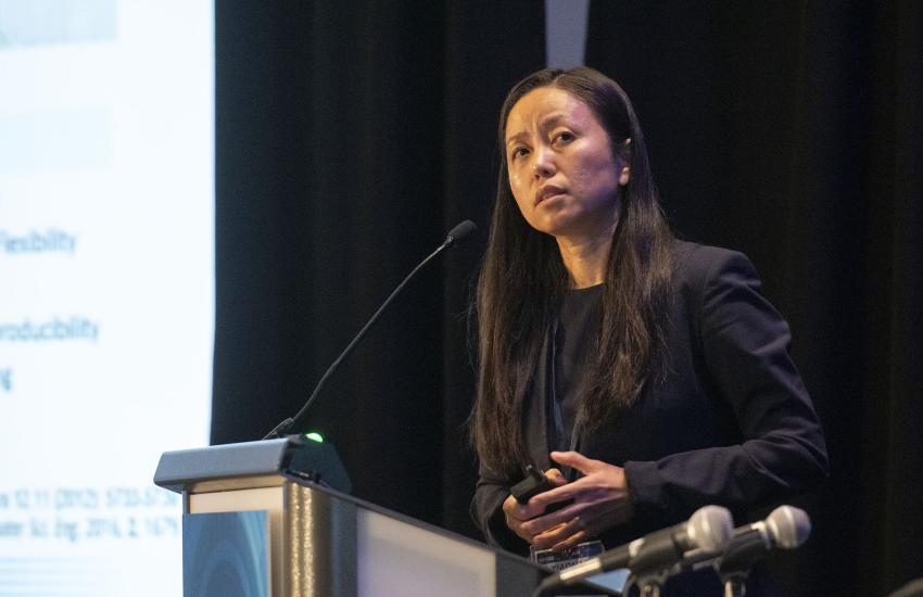 Xiaonao Liu spoke at the Military Health System Research Symposium 2023. Credit: Defense Health Agency.