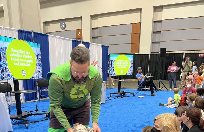 Aluminum cans are crushed and stacked together in the recycling process. Kids got a hands-on look from Michael during an event at the National Book Festival.