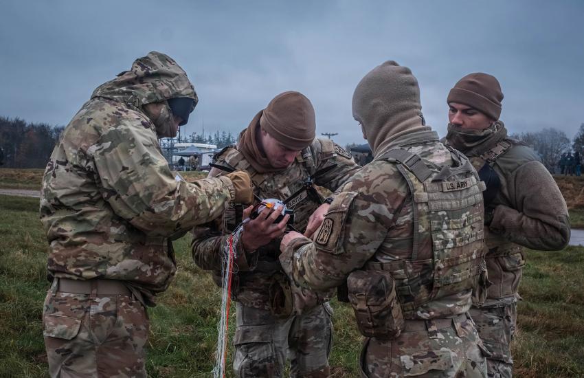 U.S. Army air defenders with 5th Battalion, 4th Air Defense Artillery Regiment, inspect drone captured by a counter-unmanned aircraft system drone interceptor during Project Flytrap 4.5 in November 2025, at the Truppenübungsplatz Putlos, Germany. U.S. Army photo by Staff Sgt. Yesenia Cadavid