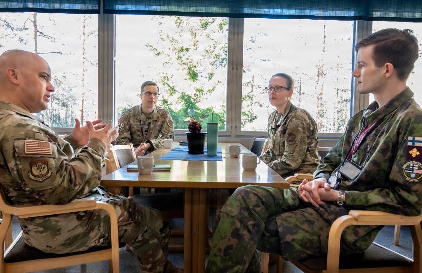 Brig. Gen. Joed Carbonell-López, commander of the 175th Wing of the Maryland Air National Guard, meets with officials during his visit to NATO Exercise Locked Shields 26 in central Finland on April 21, 2026. Credit: U.S. Air National Guard photo by Staff Sgt. Laura Virtue (This photo has been altered for security purposes by blurring out access badges.)