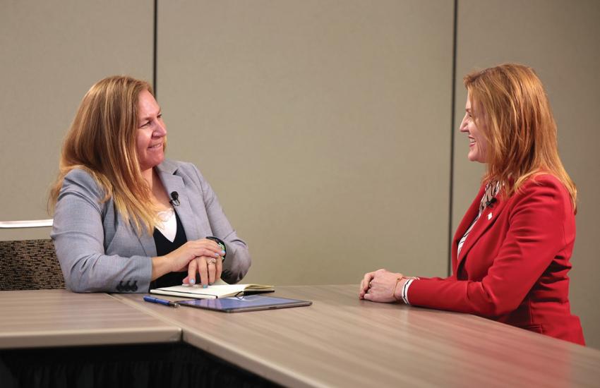 SIGNAL Media’s Kimberly Underwood records a podcast interview with Kirsten Davies, Department of War chief information officer, during TechNet Cyber in June 2026. Credit: Pure Light Images