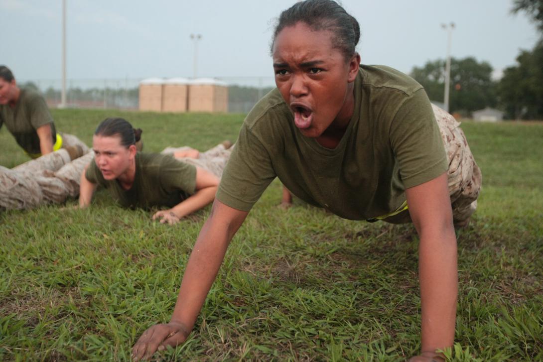 Rct. Emerald Arguelles, Platoon 4037, Papa Company, 4th Recruit Training Battalion, improves her back, core and shoulder strength by doing pushups Aug. 30, 2013, on Parris Island, S.C.