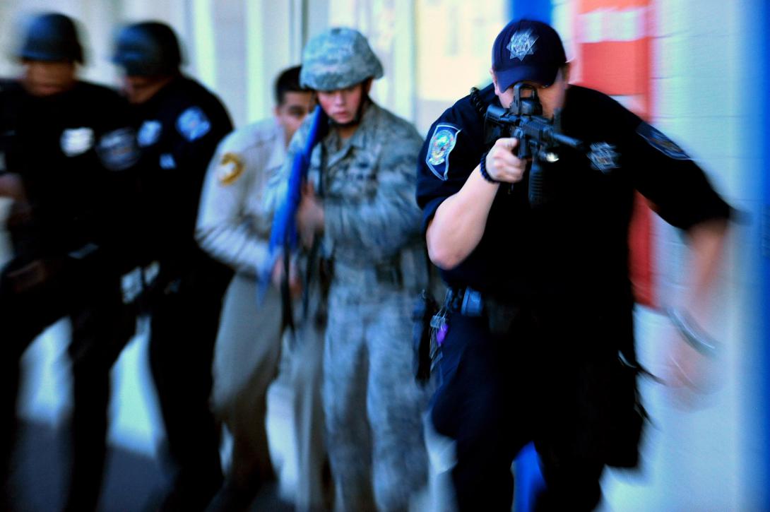 A Las Vegas based law enforcement team partakes in an active shooter exercise near Nellis Air Force Base, Nevada. Photo by Staff Sgt. William Coleman, Nellis AFB Public Affairs. 03.28.2012 