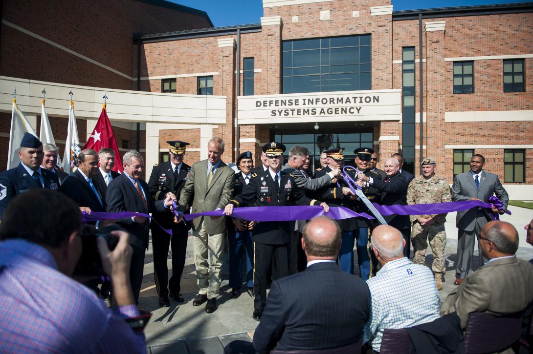Leaders cut the ribbon officially opening a new Defense Information Systems Agency compound at Scott Air Force Base, Illinois, on August 11, 2016. Photo By Staff Sgt. Clayton Lenhardt, 375th Air Mobility Wing Public Affairs.