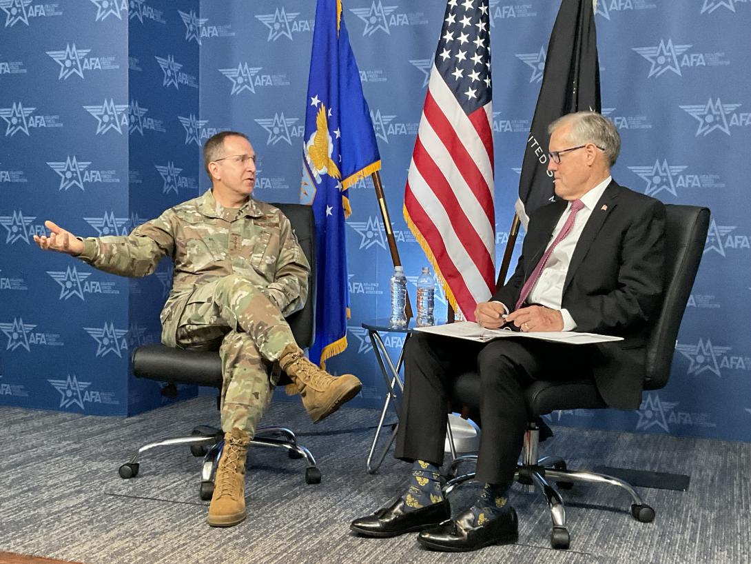Air Force Special Operations Commander Gen. James Slife speaks with Ret. Gen. Bruce Wright at an Air and Space Force Association event on September 7.