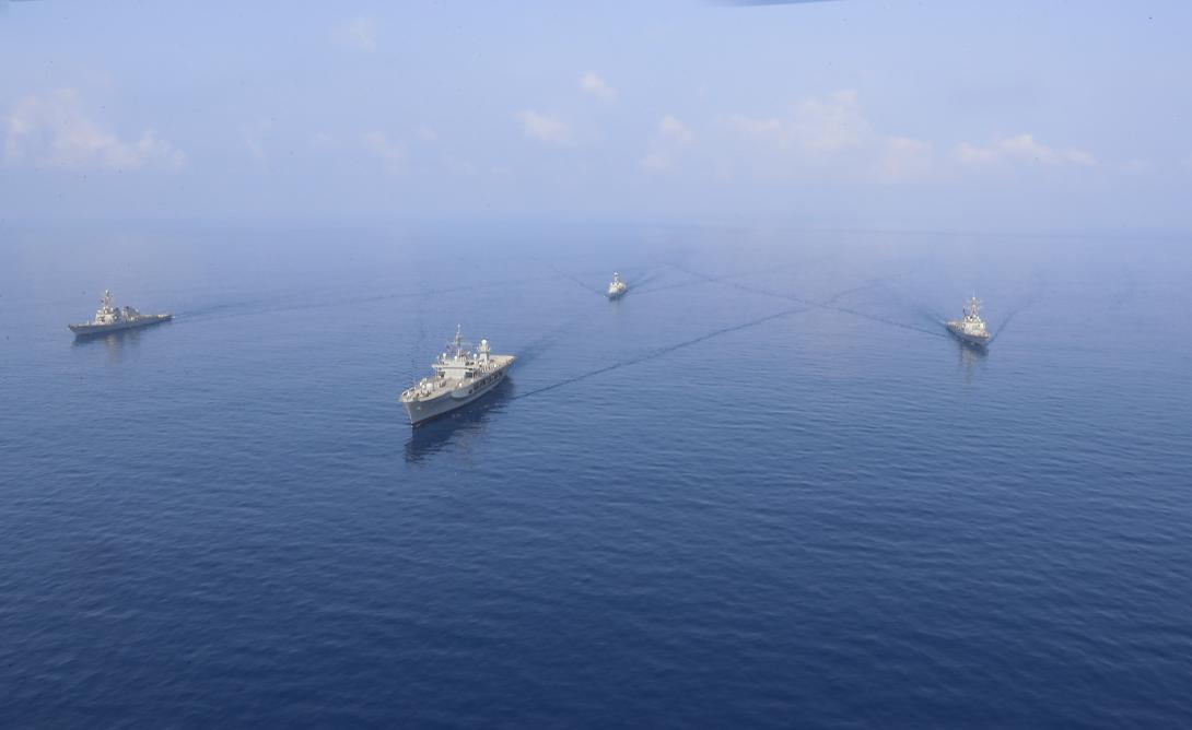 Securing waterways also requires civilians supporting the Navy's activities. Photo By: Mass Communication Specialist 3rd Class Catie Coyle.