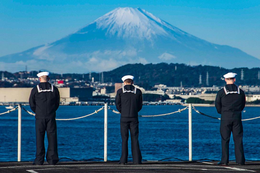 Sailors man the rails aboard the USS Ronald Reagan as the ship returns to Yokosuka, Japan on December 16., 2022, following a deployment to the western Pacific Ocean. To help ensure a free and open Indo-Pacific region, the United States and Japan are strengthening their already close alliance. Credit: Navy Petty Officer 3rd Class Oswald Felix.