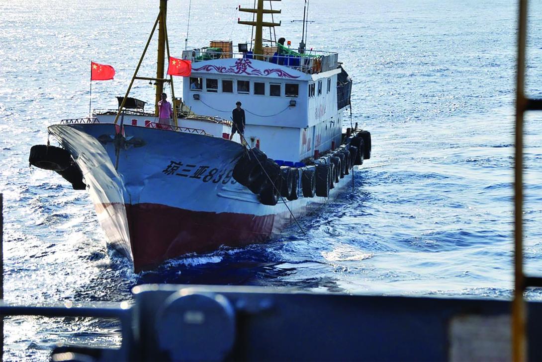 A Chinese trawler uses a grapple hook in an apparent attempt to snag the towed acoustic array of the surveillance ship USNS Impeccable. The ship was conducting routine survey operations in international waters 75 miles south of Hainan Island when it was harassed by five Chinese vessels in March 2009. Credit: U.S. Navy