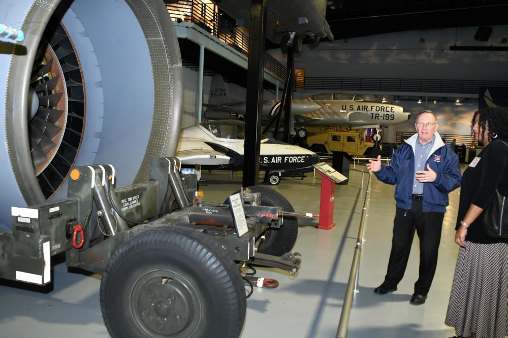 Kenneth Emery, Museum of Aviation director at Robins Air Force Base, Georgia, speaks with Natalie Hawkins, spouse of Air Force Sustainment Center Commander Lt. Gen. Stacey Hawkins on January 26, 2023. During his visit, the general identified Robins as a “bridge to the future.” U.S. Air Force photo by Tommie Horton