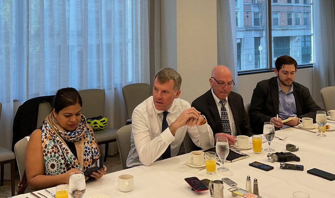 Nathan Fink (second from left), Ambassador at Large, Bureau of Cyberspace and Digital Policy, U.S. Department of State, speaks to reporters on April 12 during a Defense Writers Group event in Washington, D.C.