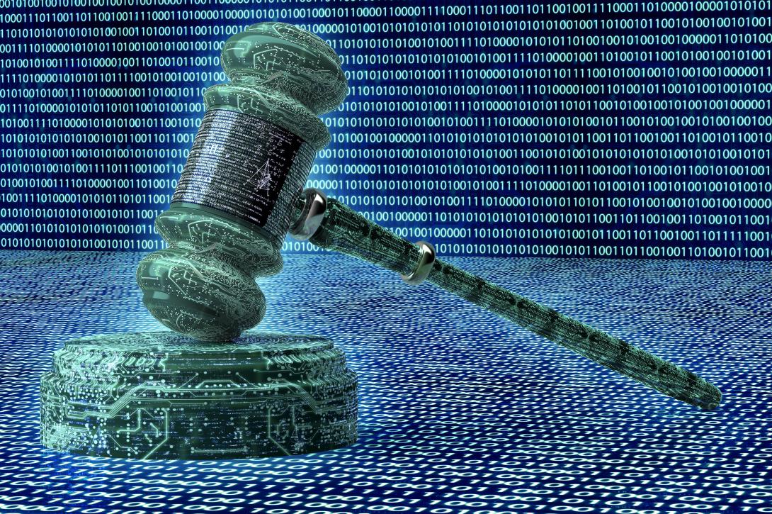 Both international and national laws influence cyber operations, and lawyers are central to integrated deterrence in the cyber domain, according to Caroline Krass, general counsel, U.S. Department of Defense. Credit: Shutterstock/posteriori