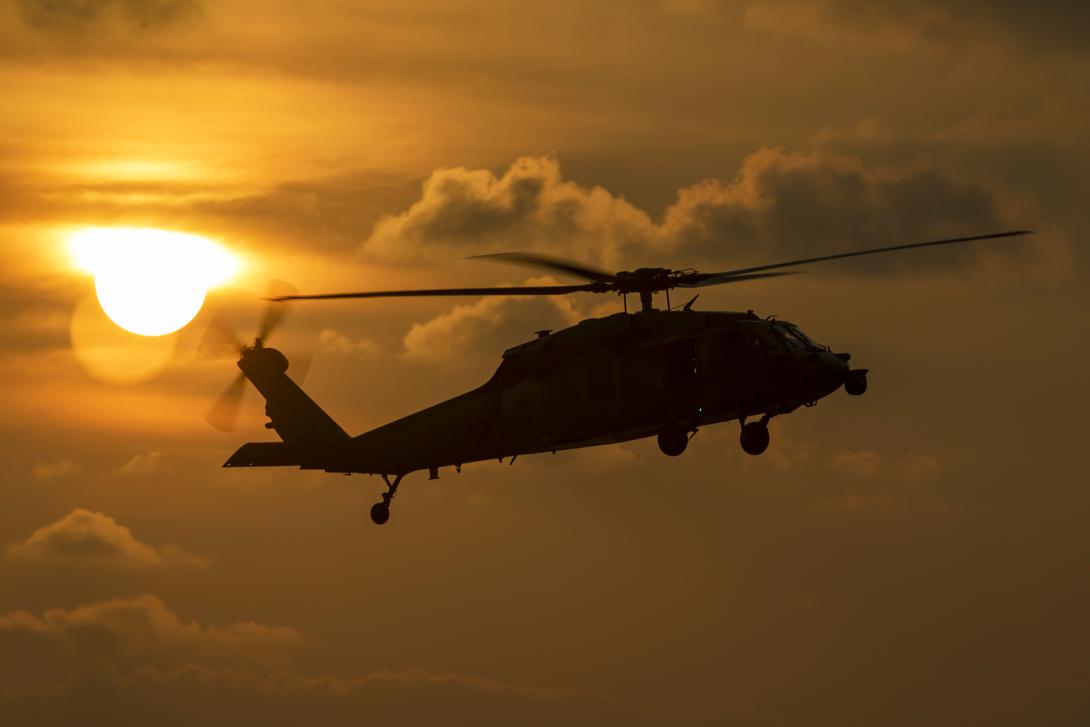 A Navy MH-60S Sea Hawk helicopter prepares to land aboard the USS Nimitz during routine operations in the South China Sea, April 17, 2023. Researchers at North Carolina State University have developed a computational model and heuristic to dramatically shorten the amount of time it takes to plan helicopter operations. Photo by Navy Petty Officer 1st Class Nathan Laird