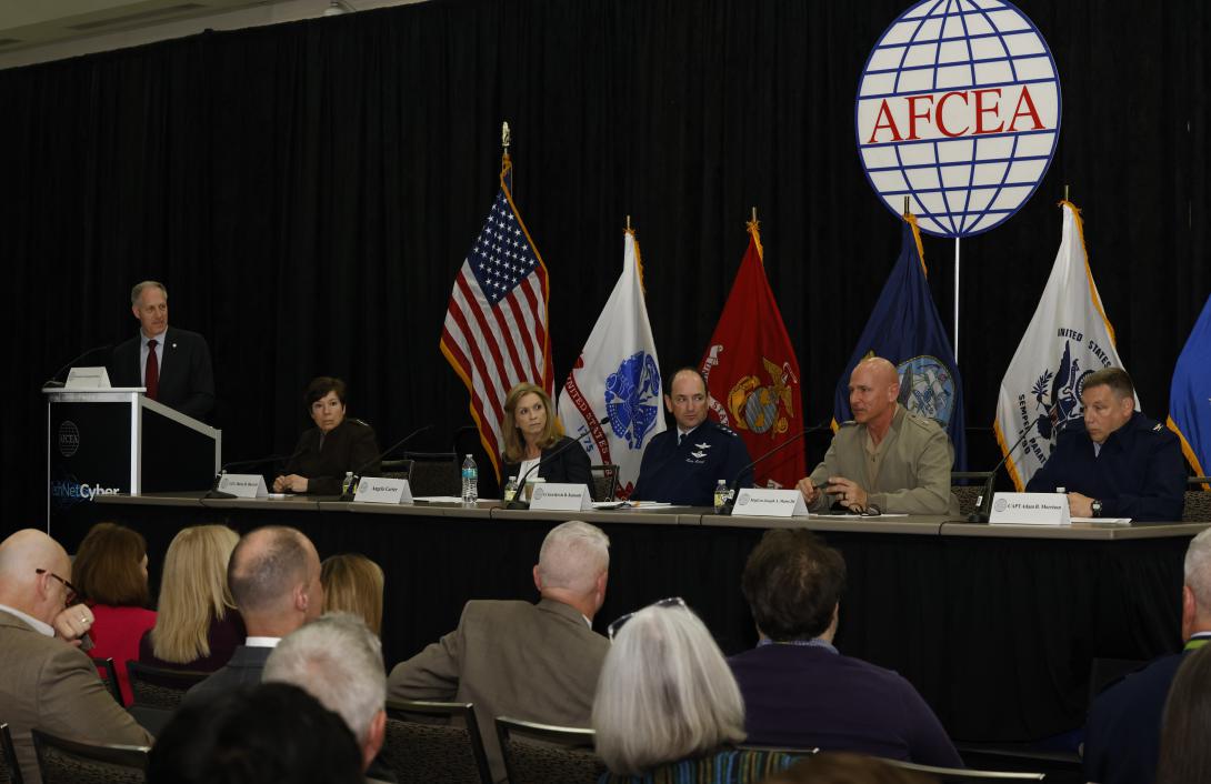 The panel “View From the Service Cyber Component Commands” speaks at AFCEA’s Technet Cyber 2023 on Tuesday.  Credit: Michael Carpenter