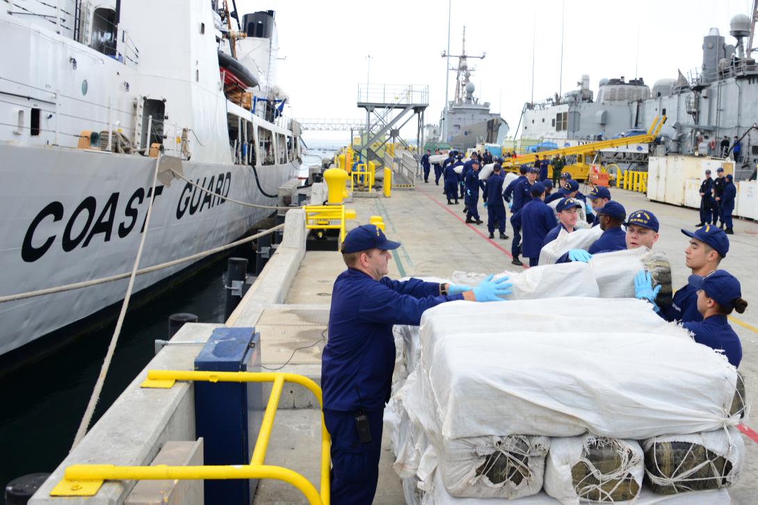 USCG and CBP partner to interdict 3,500 pounds of marijuana and over 30 pounds of methamphetamine from a boat in international waters 170 miles southwest of San Diego. U.S. Coast Guard photo by Petty Officer 3rd Class Connie Terrell. 2014. 