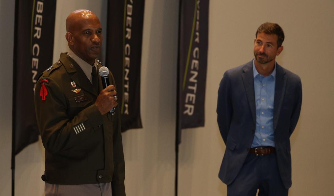 Gen. Jeth Rey, director, Network Cross-Functional Team, Army Futures Command (l), and Mark Kitz, program executive officer for tactical command, control and communications, speak during TechNet Augusta 2023.