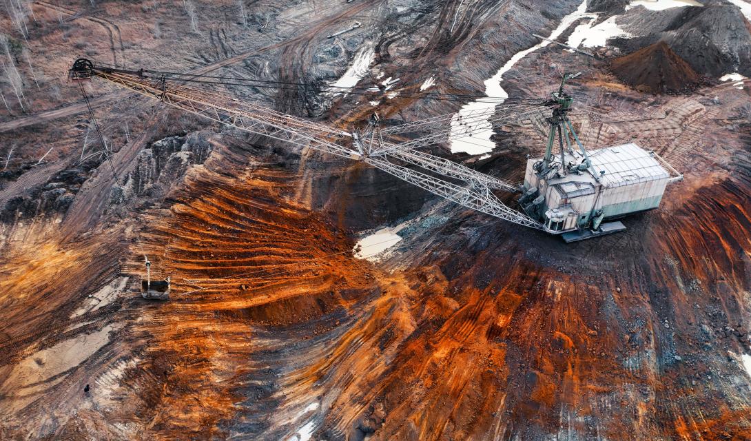 A large walking excavator works in a quarry for the extraction of rare metals. Credit: mykhailo pavlenko/Shutterstock