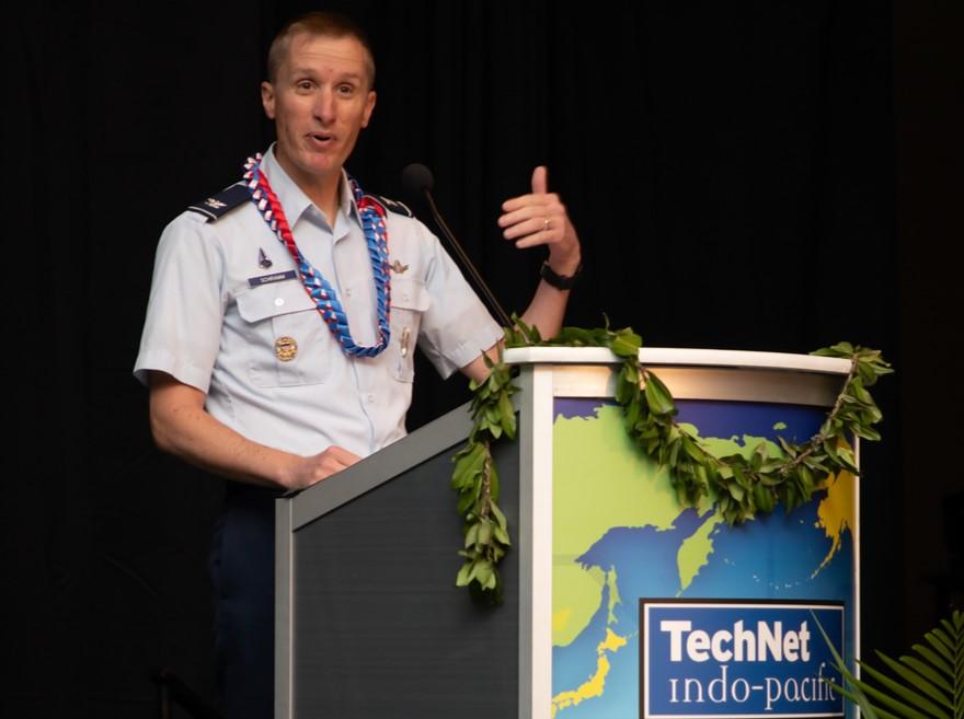 Col. Jason N. “Gazer” Schramm, deputy commander for USSPACEFOR-INDOPAC, delivers a keynote address at TechNet Indo-Pacific. Credit: Artistic Mindz Photography