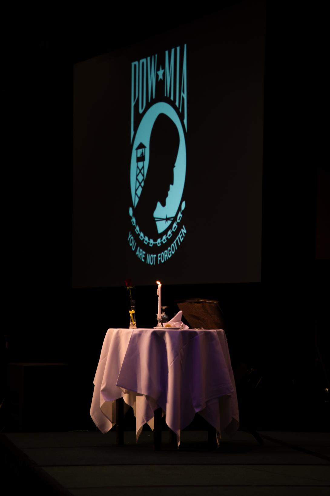 A table set for one at TechNet Indo-Pacific 2023 represents the prisoners of war and comrades missing in action. Credit: Artistic Mindz Photography. 