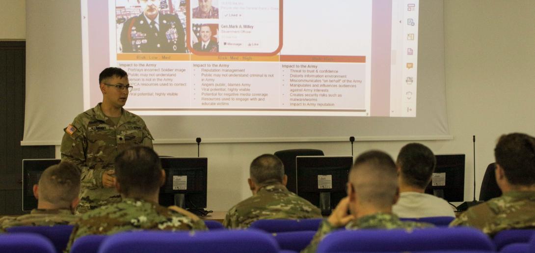 A member of the U.S. Army shares disinformation countermeasures during a joint NATO exercise in Albania. Credit: Capt. Jacob Cantu, U.S. Army Reserve.