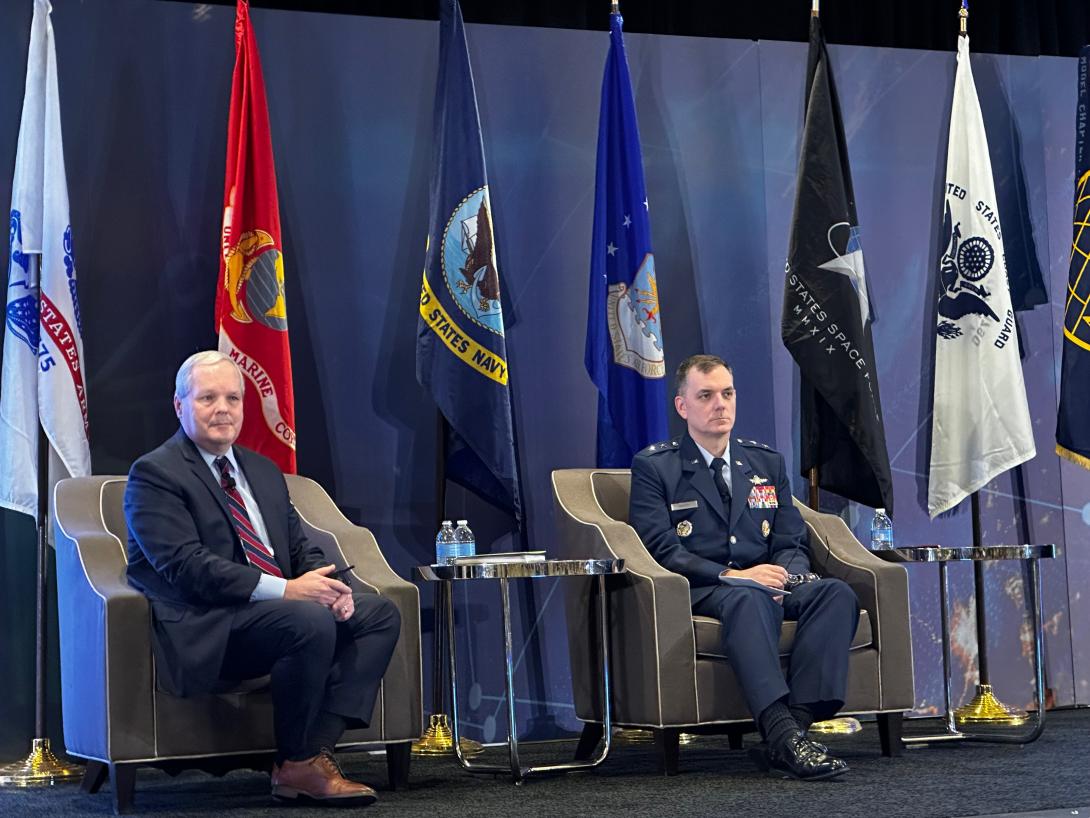 Joe McDade (l), SES, assistant deputy chief of staff for plans and programs and Maj. Gen. David Snoody, assistant deputy chief of staff for cyber effects operations, both at the Department of the Air Force, speak on December 14 at AFCEA NOVA's Air Force IT Day.