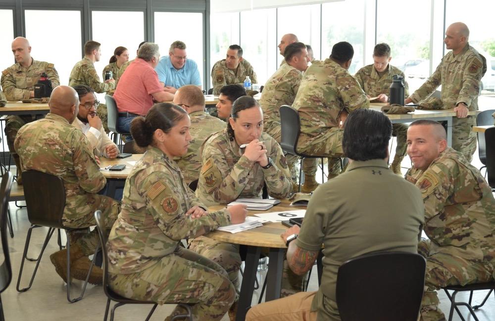 Active duty and retired Air Force leadership give advice to junior enlisted and officers during a speed-mentoring session, Friday, at Joint Base San Antonio-Kelly. To grow cyber-ready airmen and Guardians, the Department of the Air Force is making changes to its cyber career fields. U.S. Air Force photo by Matthew McGovern