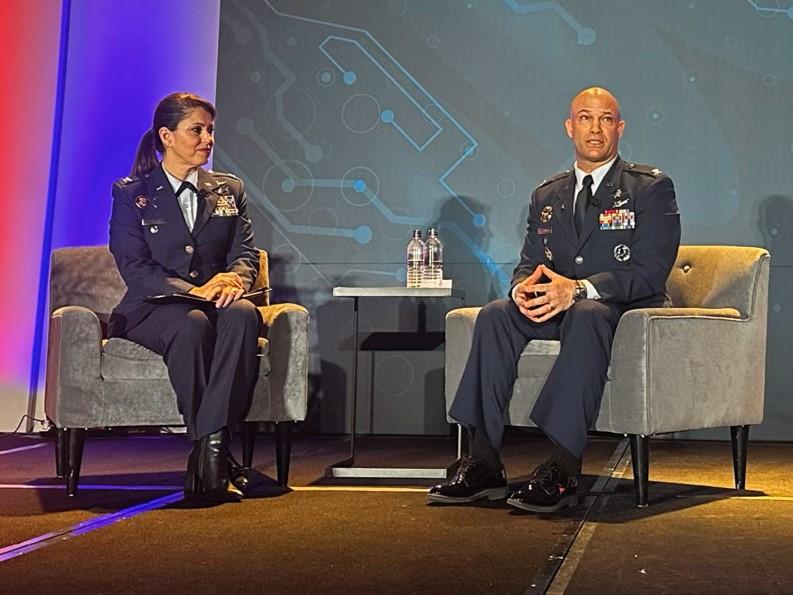 Col. Joy Kaczor, USAF, director of Cyberspace Operations and Warfighter Communications, and Col. Zachary Warakomski, senior cyber officer, U.S. Space Force, discuss U.S. Space Force cyber operations during the Rocky Mountain Cyberspace Symposium.