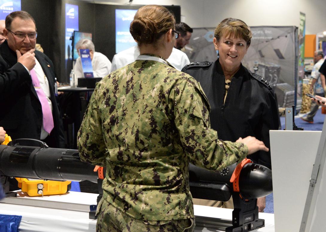U.S. Navy Vice Adm. Jan Tighe, Deputy Chief of Naval Operations for Information Warfare and Director of Naval Intelligence received a brief on underwater sensors while touring the U.S. Navy Information Warfare pavilion at the WEST 2018 conference. Credit: Rick Naystatt, U.S. Navy.