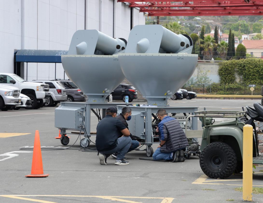 NAVWAR engineers perform checks on fleet-bound antennae. Photo credit: Rick Naystatt, U.S. Navy.