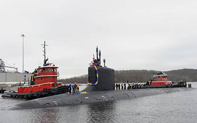 SailorsUSS Virginia sailors stand topside as their friends and families cheer their arrival in 2018. Photo creditL U.S. Navy.