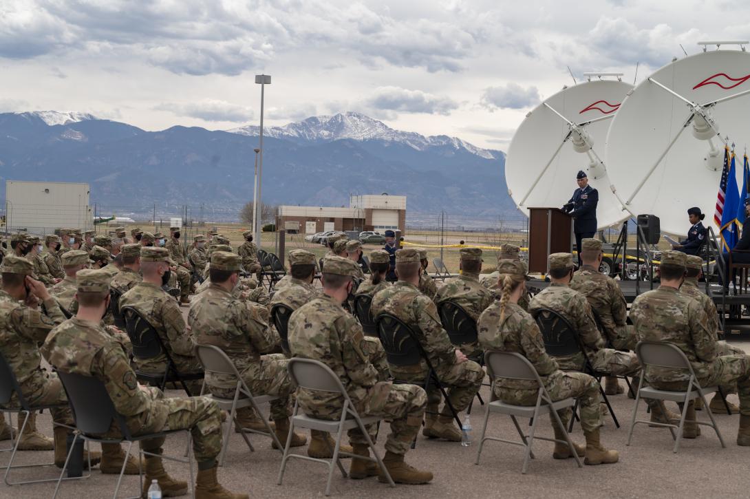 Col. Agustin Carrero, commander, 710th Operations Group speaks during the 380th Space Control Squadron's ribbon-cutting ceremony for the Bounty Hunter 2.0 training system at Peterson Air Force Base, Colorado, May 1, 2021. The Space Force is succeeding with its Integrated Mission Delta concept that brings in sustainment and acquisition into the delta structure. Credit: Tech. Sgt. Frank Casciotta, 310th Space Wing Public Affairs