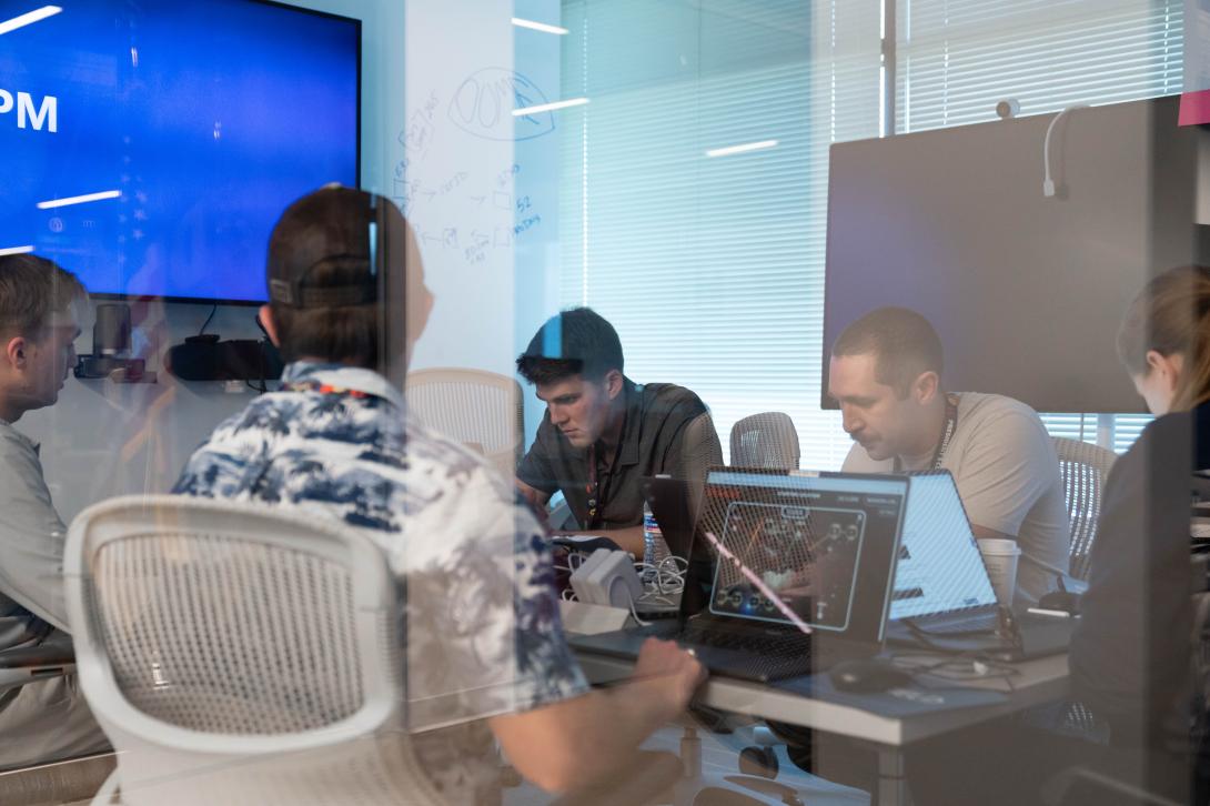 Participants of the 5th annual President's Cup Cybersecurity Competitions are focused on the challenges. Photo courtesy of CISA.