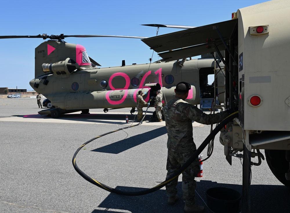 A CH-47 Chinook helicopter from the Nevada Army National Guard receives a fuel up at the Sacramento Mather Airport in Rancho Cordova, California, to join the California National Guard’s aerial assets in support of the California Department of Forestry and Fire Protection’s wildfire response to multiple large-scale fires in July. With a demanding dual state-federal mission, the U.S. National Guard needs the right kind of information technology. Credit: U.S. Army National Guard photo by Amanda Johnson
