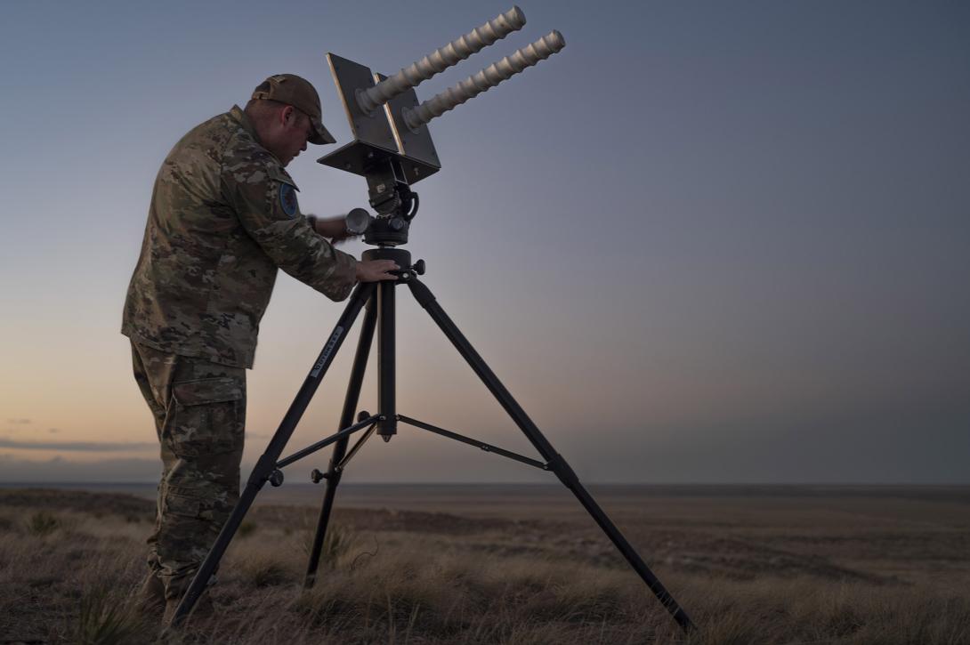 U.S. Space Force Tech Sgt. Kyle Yeager prepares an electronic warfare helical antenna in an exercise.