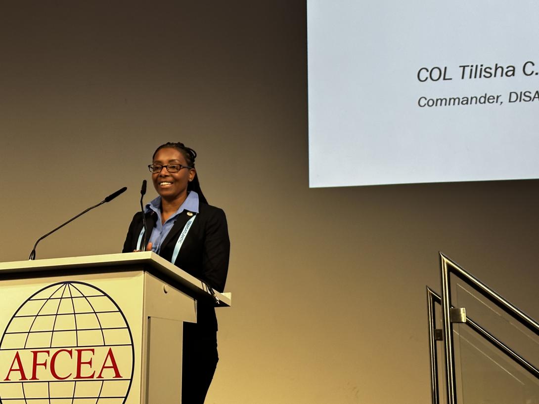 Col. Tilisha Lockley, USA, commander of the Defense Information Systems Agency, or DISA, speaks December 5 at AFCEA’s TechNet Transatlantic conference in Frankfurt.