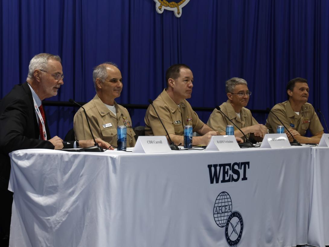 Rear Adm. Kavon “Hak” Hakimzadeh, commander for Carrier Strike Group 2, speaks on a panel at WEST 2025 in San Diego. Credit: Michael Carpenter