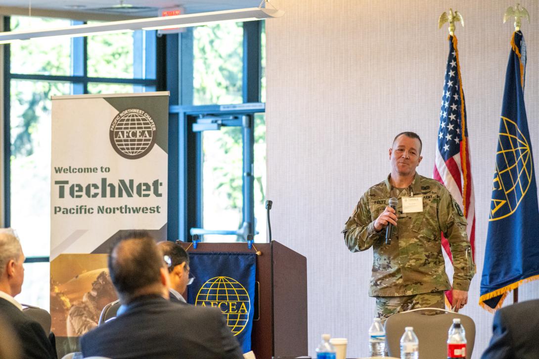 Col. Joel Feltz, commander, 22nd Corps Signal Brigade, addresses the audience at TechNet Pacific Northwest 2025 at Joint Base Lewis-McChord in Washington state. Credit: Justin Manuel