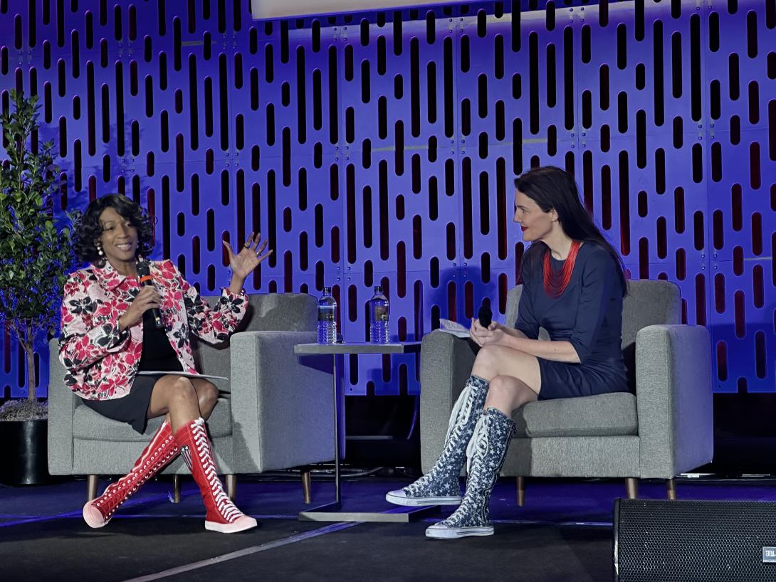 Venice Goodwine, Senior Executive Service, Chief Information Officer (CIO), Department of the Air Force (l) speaks with Alexis Bonnell, CIO and Director, Digital Capabilities Directorate, Air Force Research Laboratory, at the AFCEA Rocky Mountain Cyberspace Symposium on February 13.